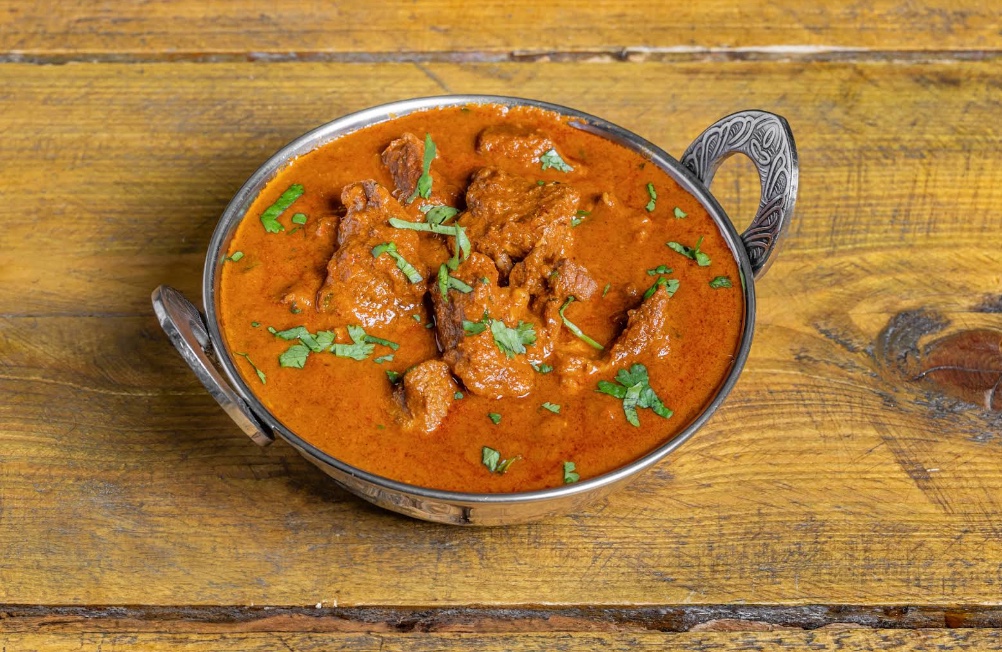 Makhanza lamb curry served in a traditional bowl